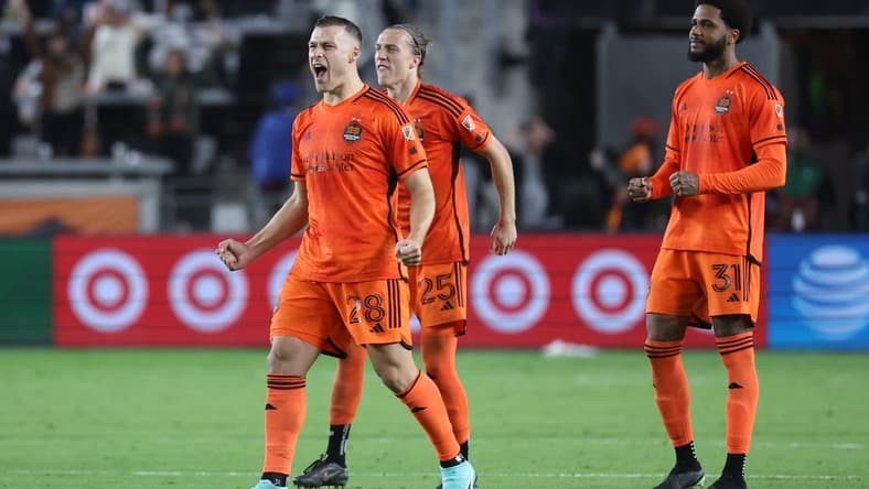 Nov 11, 2023; Houston, Texas, USA; Houston Dynamo defender Erik Sviatchenko (28), midfielder Griffin Dorsey (25), and defender Micael (31) react after the game against Real Salt Lake at Shell Energy Stadium. Mandatory Credit: Troy Taormina-USA TODAY Sports
