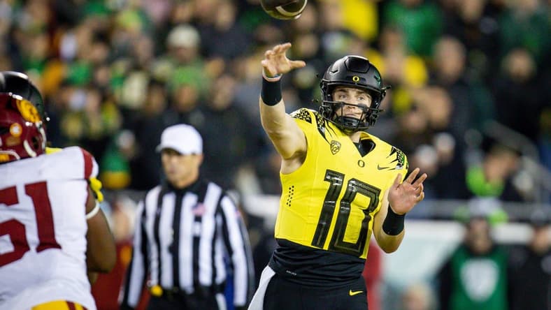 Oregon quarterback Bo Nix throws out a pass as the No. 6 Oregon Ducks host the USC Trojans Saturday, Nov. 11, 2023, at Autzen Stadium in Eugene, Ore.