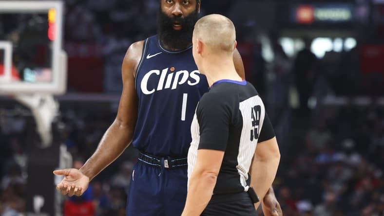 Nov 12, 2023; Los Angeles, California, USA; LA Clippers guard James Harden (1) speaks with the referee during the first half of a game against the Memphis Grizzlies at Crypto.com Arena. Mandatory Credit: Jessica Alcheh-USA TODAY Sports