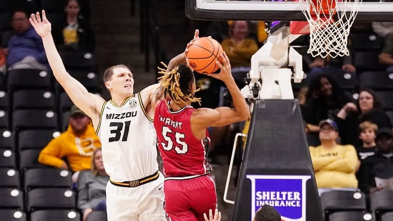 Nov 13, 2023; Columbia, Missouri, USA; SIU Edwardsville Cougars forward Lamar Wright (55) shoots as Missouri Tigers guard Caleb Grill (31) defends during the first half at Mizzou Arena. Mandatory Credit: Denny Medley-USA TODAY Sports