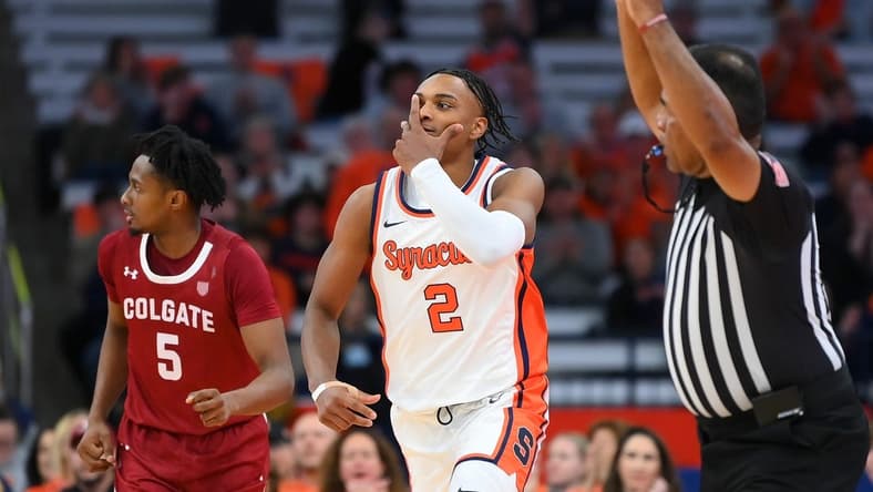Nov 14, 2023; Syracuse, New York, USA; Syracuse Orange guard JJ Starling (2) reacts to a three-point basket against the Colgate Raiders during the first half at the JMA Wireless Dome. Mandatory Credit: Rich Barnes-USA TODAY Sports
