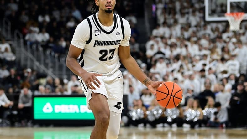 Nov 14, 2023; Providence, Rhode Island, USA; Providence Friars forward Bryce Hopkins (23) passes the ball during the first half Wisconsin Badgers at Amica Mutual Pavilion. Mandatory Credit: Eric Canha-USA TODAY Sports