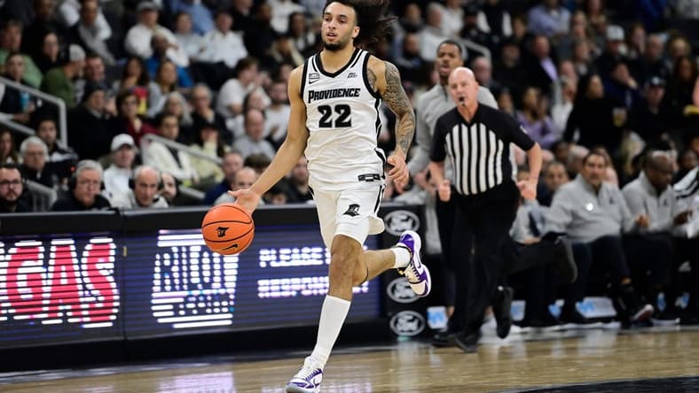 Nov 14, 2023; Providence, Rhode Island, USA; Providence Friars guard Devin Carter (22) drives up the court during the first half against the Wisconsin Badgers at Amica Mutual Pavilion. Mandatory Credit: Eric Canha-USA TODAY Sports
