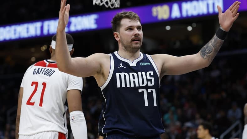 Nov 15, 2023; Washington, District of Columbia, USA; Dallas Mavericks guard Luka Doncic (77) gestures after scoring against the Washington Wizards in the second quarter at Capital One Arena. Mandatory Credit: Geoff Burke-USA TODAY Sports