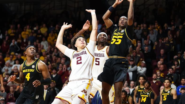 Nov 16, 2023; Minneapolis, Minnesota, USA; Missouri Tigers guard Sean East II (55) shoots against the Minnesota Golden Gophers during the second half at Williams Arena. Mandatory Credit: Matt Krohn-USA TODAY Sports
