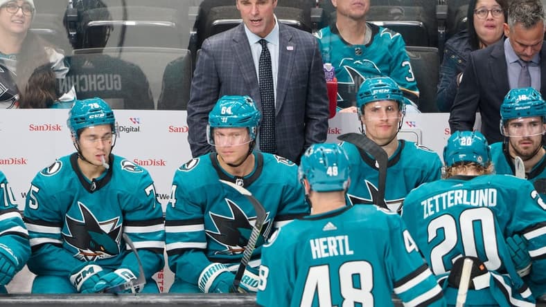 Nov 16, 2023; San Jose, California, USA; San Jose Sharks head coach David Quinn watches the game from the bench against the St. Louis Blues during the third period at SAP Center at San Jose. Mandatory Credit: Robert Edwards-USA TODAY Sports