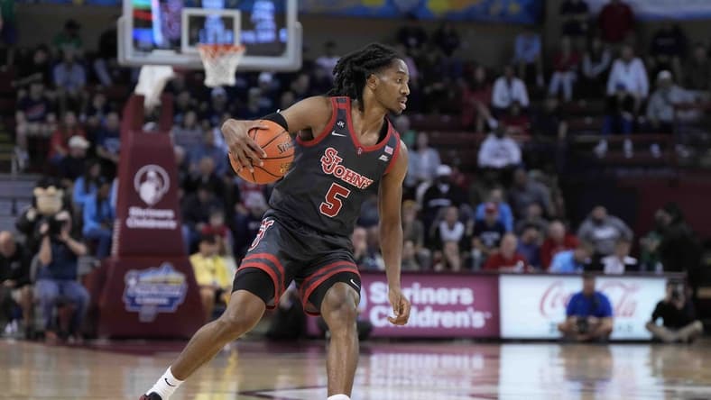 Nov 17, 2023; Charleston, SC, USA; St. John's Red Storm guard Daniss Jenkins (5) drives the ball in the first half against the Dayton Flyers at TD Arena. Mandatory Credit: David Yeazell-USA TODAY Sports