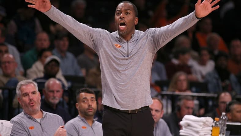 Nov 17, 2023; Brookyln, NY, USA; Oklahoma State Cowboys head coach Mike Boynton coaches against the Notre Dame Fighting Irish during the second half at Barclays Center. Mandatory Credit: Brad Penner-USA TODAY Sports