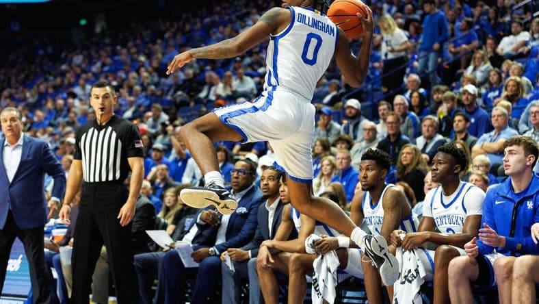Nov 17, 2023; Lexington, Kentucky, USA; Kentucky Wildcats guard Rob Dillingham (0) saves a ball from going out of bounds during the first half against the Stonehill Skyhawks at Rupp Arena at Central Bank Center. Mandatory Credit: Jordan Prather-USA TODAY Sports