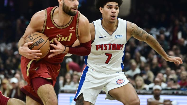 Nov 17, 2023; Cleveland, Ohio, USA; Cleveland Cavaliers guard Max Strus (1) drives to the basket against Detroit Pistons guard Killian Hayes (7) during the first half at Rocket Mortgage FieldHouse. Mandatory Credit: Ken Blaze-USA TODAY Sports