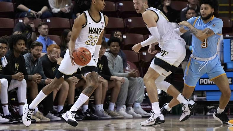 Nov 17, 2023; Charleston, SC, USA; Wake Forest Demon Deacons guard Hunter Sallis (23) drives with the ball in the second half against the Towson Tigers at TD Arena. Mandatory Credit: David Yeazell-USA TODAY Sports
