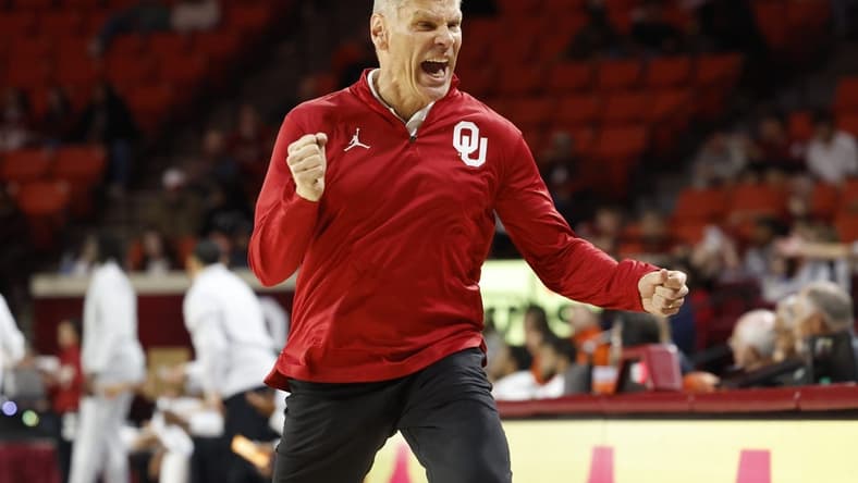 Nov 17, 2023; Norman, Oklahoma, USA; Oklahoma Sooners head coach Porter Moser reacts after his team scores against UT Rio Grande Valley Vaqueros during the second half at Lloyd Noble Center. Mandatory Credit: Alonzo Adams-USA TODAY Sports