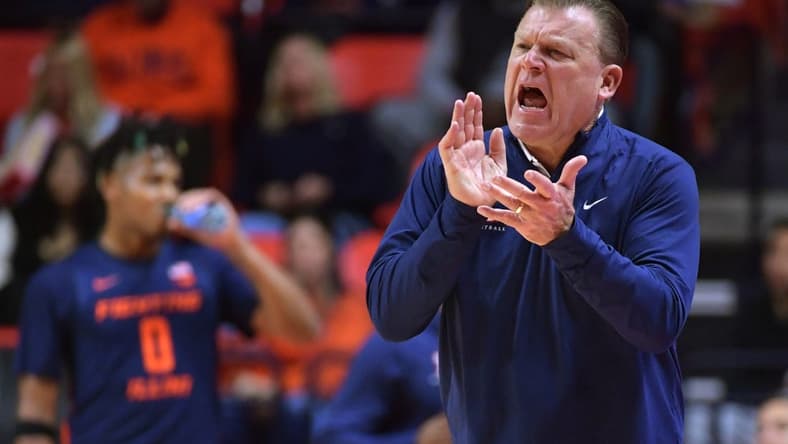 Nov 17, 2023; Champaign, Illinois, USA; Illinois Fighting Illini head coach Brad Underwood reacts off the bench during the second half against the Valparaiso Beacons at State Farm Center. Mandatory Credit: Ron Johnson-USA TODAY Sports