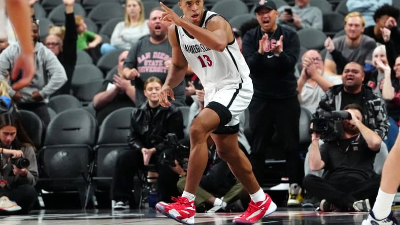 Nov 17, 2023; Las Vegas, NV, USA; San Diego State Aztecs forward Jaedon LeDee (13) celebrates after scoring against the Saint Mary's Gaels during the second half at T-Mobile Arena. Mandatory Credit: Stephen R. Sylvanie-USA TODAY Sports