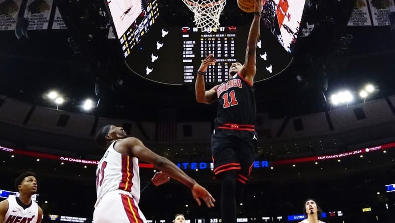 Nov 18, 2023; Chicago, Illinois, USA; Miami Heat center Bam Adebayo (13) defends Chicago Bulls forward DeMar DeRozan (11) during the second half at United Center. Mandatory Credit: David Banks-USA TODAY Sports