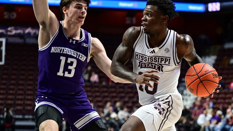 Nov 19, 2023; Uncasville, CT, USA; Mississippi State Bulldogs guard Josh Hubbard (13) looks to shoot the ball defended by Northwestern Wildcats guard Brooks Barnhizer (13) during the second half at Mohegan Sun Arena. Mandatory Credit: Mark Smith-USA TODAY Sports
