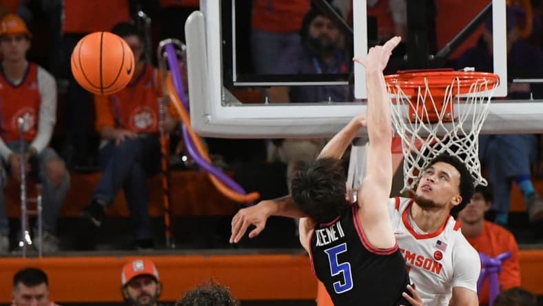Sunday, November 19, 2023; Pickens County, SC; Clemson senior guard Chase Hunter (1) blocks the shot of Boise State guard RJ Keene (5) during the second half at Littlejohn Coliseum. Mandatory Credit: Ken Ruinard-USA TODAY NETWORK