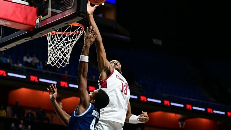 Nov 19, 2023; Uncasville, CT, USA; Washington State Cougars forward Isaac Jones (13) blocks a sot by Rhode Island Rams guard Cam Estevez (4) during the first half at Mohegan Sun Arena. Mandatory Credit: Mark Smith-USA TODAY Sports