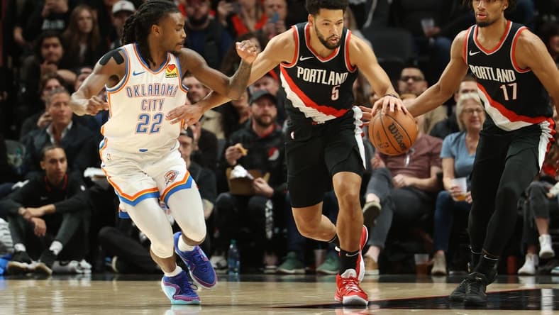 Nov 19, 2023; Portland, Oregon, USA;  Portland Trail Blazers guard Skylar Mays (5) dribbles up the court past Oklahoma City Thunder guard Cason Wallace (22) in the first half at Moda Center. Mandatory Credit: Jaime Valdez-USA TODAY Sports
