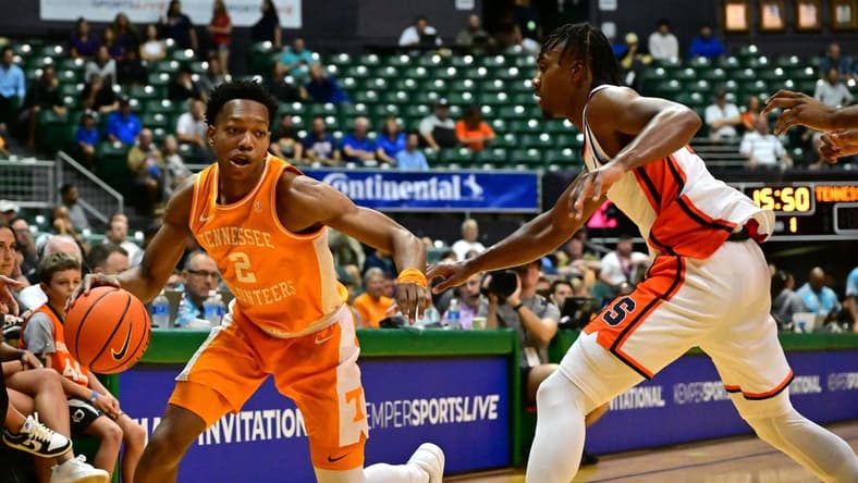 Nov 20, 2023; Honolulu, Hawaii, USA;  Tennessee Volunteers guard Jordan Gainey (2) drives the ball around Syracuse Orange guard JJ Starling (2) during the first period at SimpliFi Arena at Stan Sheriff Center. Mandatory Credit: Steven Erler-USA TODAY Sports