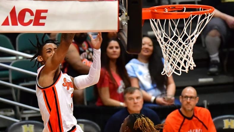 Nov 20, 2023; Honolulu, Hawaii, USA;  Syracuse Orange guard Judah Mintz (3) attempted a shot while defended by Tennessee Volunteers guard Jahmai Mashack (15) during the second period at SimpliFi Arena at Stan Sheriff Center. Mandatory Credit: Steven Erler-USA TODAY Sports