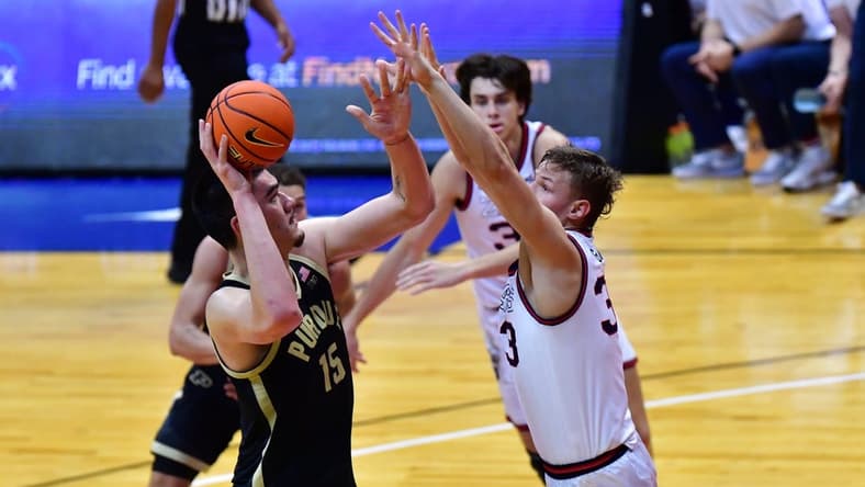 Nov 20, 2023; Honolulu, Hawaii, USA;  Purdue Boilermakers center Zach Edey (15) shoots while being defended by Gonzaga Bulldogs forward Ben Gregg (33) during the first half at SimpliFi Arena at Stan Sheriff Center. Mandatory Credit: Steven Erler-USA TODAY Sports