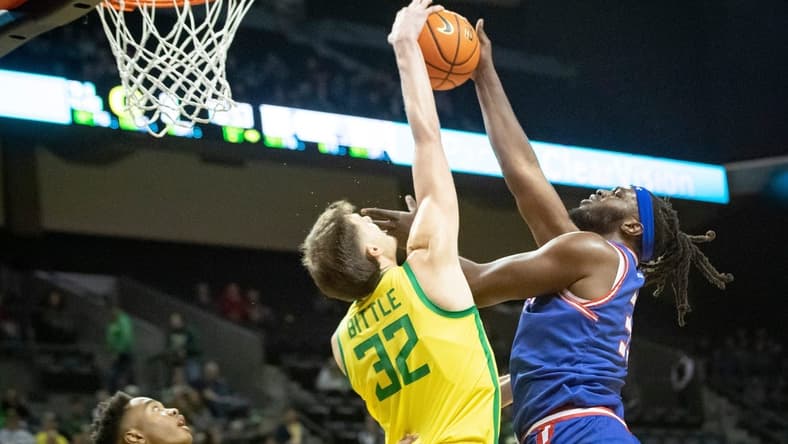 Oregon center Nate Bittle blocks a shot by Tennessee State forward Jason Jitoboh as the Oregon Ducks host Tennessee State Friday, Nov. 17, 2023, at Matthew Knight Arena in Eugene, Ore.