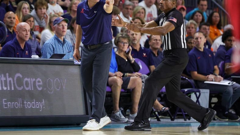 Nov 20, 2023; Fort Myers, Florida, USA;  Virginia Cavaliers head coach Tony Bennett reacts after a play against the Wisconsin Badgers in the first half during the Fort Myers Top-Off at Suncoast Credit Union Arena. Mandatory Credit: Nathan Ray Seebeck-USA TODAY Sports