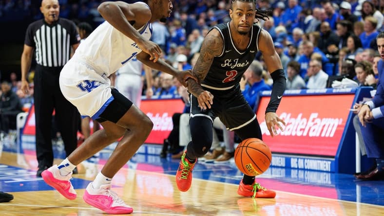 Nov 20, 2023; Lexington, Kentucky, USA; Saint Joseph's Hawks guard Erik Reynolds II (2) drives to the basket during the first half against the Kentucky Wildcats at Rupp Arena at Central Bank Center. Mandatory Credit: Jordan Prather-USA TODAY Sports