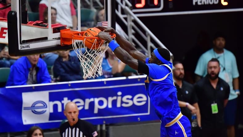 Nov 20, 2023; Honolulu, Hawaii, USA;  UCLA Bruins forward Adem Bona (3) dunks the ball against the Marquette Golden Eagles during the second period at SimpliFi Arena at Stan Sheriff Center. Mandatory Credit: Steven Erler-USA TODAY Sports