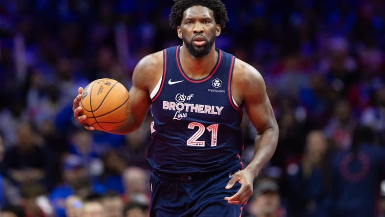 Nov 21, 2023; Philadelphia, Pennsylvania, USA; Philadelphia 76ers center Joel Embiid (21) dribbles the ball against the Cleveland Cavaliers during the fourth quarter at Wells Fargo Center. Mandatory Credit: Bill Streicher-USA TODAY Sports