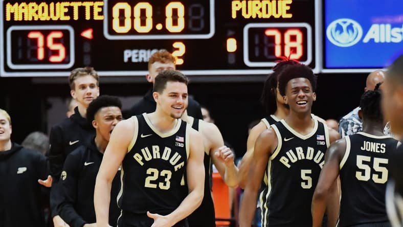 Nov 22, 2023; Honolulu, HI, USA; Purdue Boilermakers forward Camden Heide (23) and guard Myles Colvin (5) celebrate as time expired to defeat the Marquette Golden Eagles 78-75 at SimpliFi Arena at Stan Sheriff Center. Mandatory Credit: Steven Erler-USA TODAY Sports