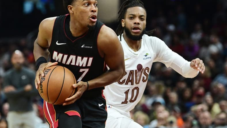 Nov 22, 2023; Cleveland, Ohio, USA; Miami Heat guard Kyle Lowry (7) drives to the basket against Cleveland Cavaliers guard Darius Garland (10) during the first half at Rocket Mortgage FieldHouse. Mandatory Credit: Ken Blaze-USA TODAY Sports