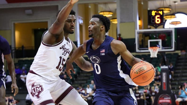 Nov 23, 2023; Kissimmee, FL, USA;  Penn State Nittany Lions guard Kanye Clary (0) drives to the hoop guarded by Texas A&M Aggies forward Henry Coleman III (15) in the first half during the ESPN Events Invitational at State Farm Field House. Mandatory Credit: Nathan Ray Seebeck-USA TODAY Sports