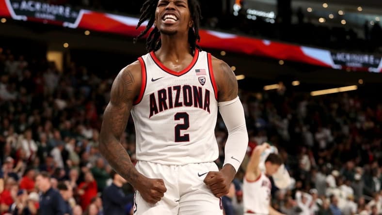 Arizona Wildcats guard Caleb Love (2) reacts during the first half of the first-ever Acrisure Classic against Michigan State in Palm Desert, Calif., on Thanksgiving Day, Nov. 23, 2023.