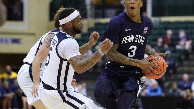 Nov 24, 2023; Kissimmee, FL, USA;  Penn State Nittany Lions guard Nick Kern Jr. (3) looks to pass the the ball guarded y Butler Bulldogs guard Posh Alexander (5) in the first half during the ESPN Events Invitational Consolation game 1 at State Farm Field House. Mandatory Credit: Nathan Ray Seebeck-USA TODAY Sports