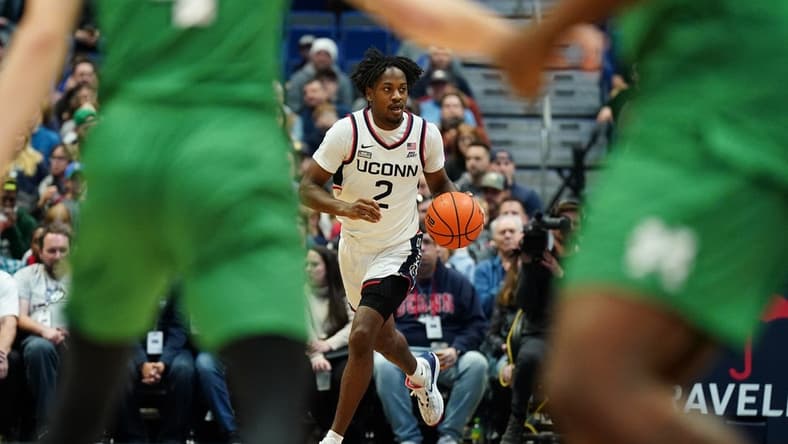 Nov 24, 2023; Hartford, Connecticut, USA; UConn Huskies guard Tristen Newton (2) returns the ball again st the Manhattan Jaspers in the first half at XL Center. Mandatory Credit: David Butler II-USA TODAY Sports