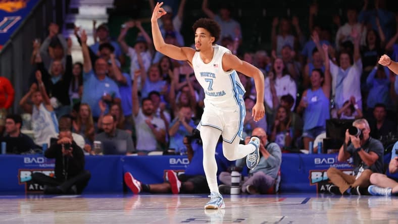 Nov 24, 2023; Paradise Island, BAHAMAS;  North Carolina Tar Heels guard Seth Trimble (7) reacts after scoring during the second half against the Arkansas Razorbacks at Imperial Arena. Mandatory Credit: Kevin Jairaj-USA TODAY Sports