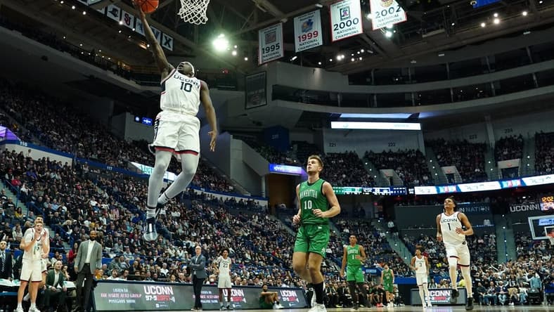 Nov 24, 2023; Hartford, Connecticut, USA; UConn Huskies guard Hassan Diarra (10) steals the ball and makes a basket against the Manhattan Jaspers in the second half at XL Center. Mandatory Credit: David Butler II-USA TODAY Sports