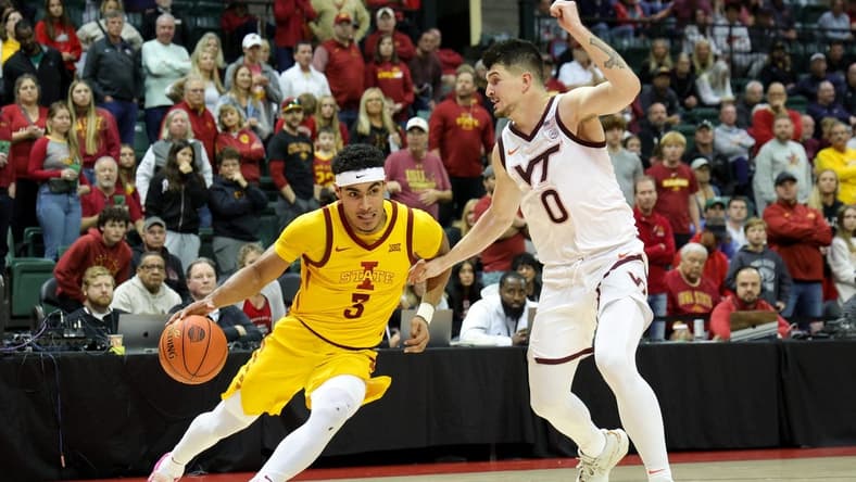 Nov 24, 2023; Kissimmee, FL, USA; Iowa State Cyclones guard Tamin Lipsey (3) drives to the hoop guarded by Virginia Tech Hokies guard Hunter Cattoor (0) in the second half during the ESPN Events Invitational Semifinal at State Farm Field House. Mandatory Credit: Nathan Ray Seebeck-USA TODAY Sports