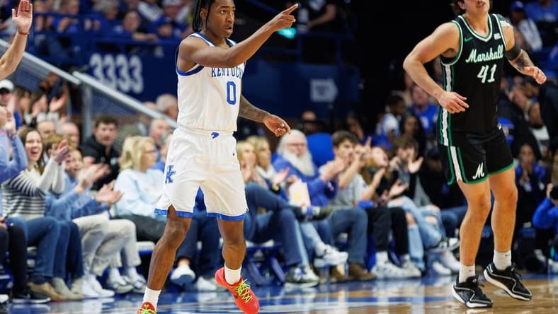 Nov 24, 2023; Lexington, Kentucky, USA; Kentucky Wildcats guard Rob Dillingham (0) celebrates after making a basket during the first half against the Marshall Thundering Herd at Rupp Arena at Central Bank Center. Mandatory Credit: Jordan Prather-USA TODAY Sports