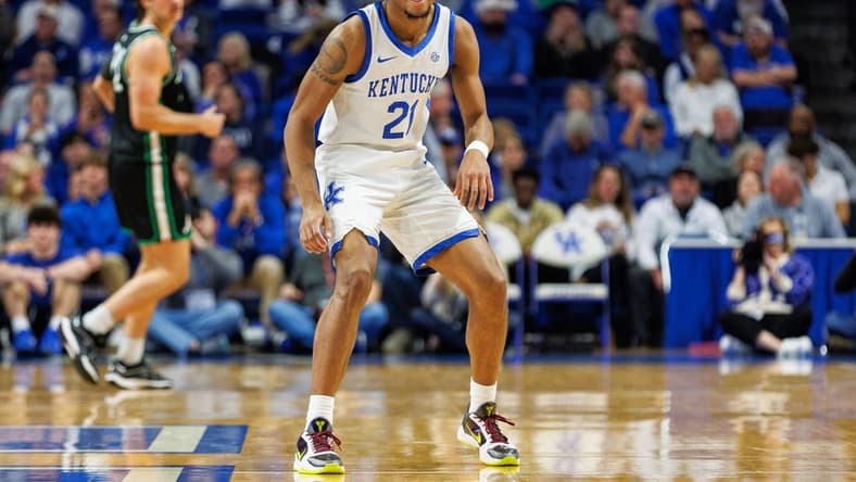 Nov 24, 2023; Lexington, Kentucky, USA; Kentucky Wildcats guard D.J. Wagner (21) smiles during the second half against the Marshall Thundering Herd at Rupp Arena at Central Bank Center. Mandatory Credit: Jordan Prather-USA TODAY Sports