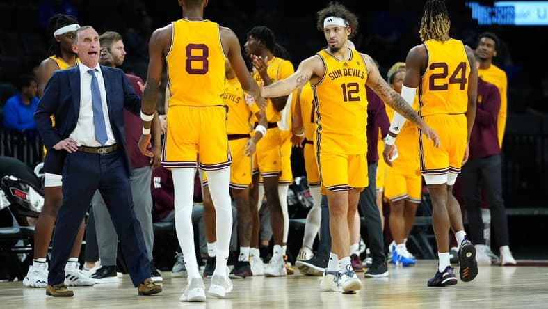 Nov 24, 2023; Las Vegas, NV, USA; Arizona State Sun Devils guard Jose Perez (12) congratulates Arizona State Sun Devils forward Alonzo Gaffney (8) after the Sun Devils defeated the Vanderbilt Commodores 82-67 at Michelob ULTRA Arena. Mandatory Credit: Stephen R. Sylvanie-USA TODAY Sports