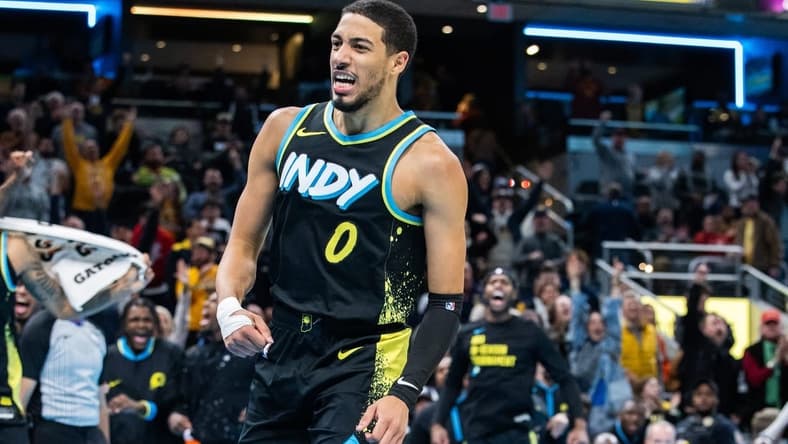 Nov 24, 2023; Indianapolis, Indiana, USA; Indiana Pacers guard Tyrese Haliburton (0) celebrates a made basket  in the second half against the Detroit Pistons at Gainbridge Fieldhouse. Mandatory Credit: Trevor Ruszkowski-USA TODAY Sports