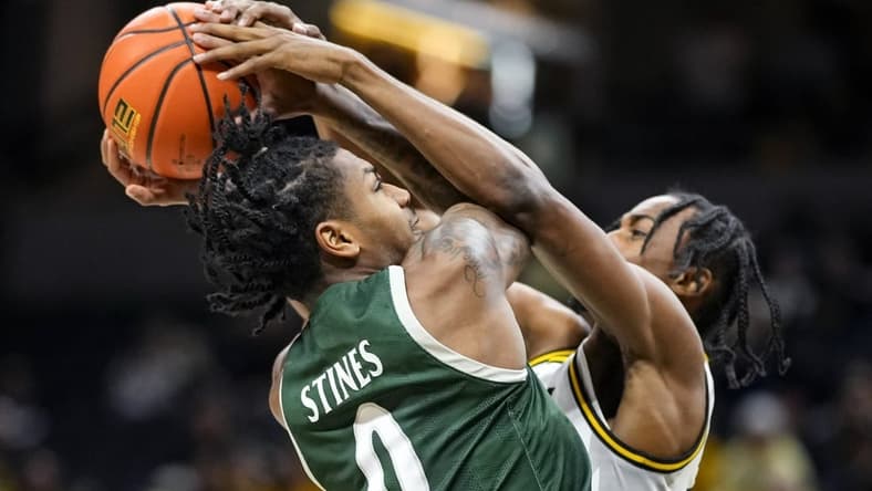 Nov 25, 2023; Columbia, Missouri, USA; Missouri Tigers forward Aidan Shaw (23) blocks the shot of Loyola (Md) Greyhounds guard D'Angelo Stines (0) during the first half at Mizzou Arena. Mandatory Credit: Jay Biggerstaff-USA TODAY Sports
