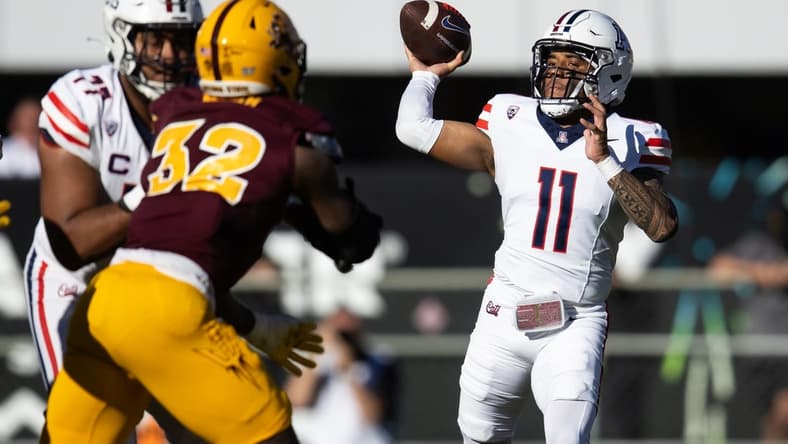 Nov 25, 2023; Tempe, Arizona, USA; Arizona Wildcats quarterback Noah Fifita (11) against the Arizona State Sun Devils in the first half of the Territorial Cup at Mountain America Stadium. Mandatory Credit: Mark J. Rebilas-USA TODAY Sports
