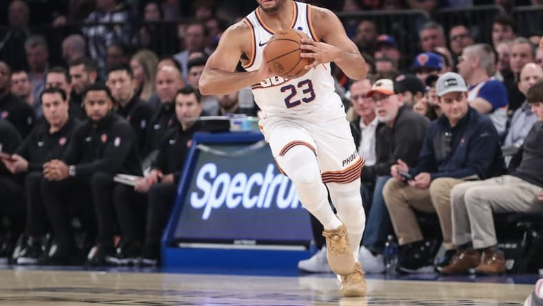 Nov 26, 2023; New York, New York, USA; Phoenix Suns guard Eric Gordon (23) looks to make a pass in the first quarter against the New York Knicks at Madison Square Garden. Mandatory Credit: Wendell Cruz-USA TODAY Sports