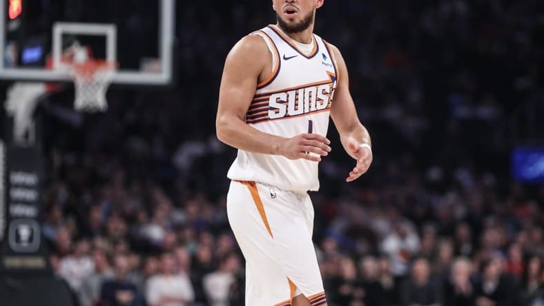 Nov 26, 2023; New York, New York, USA; Phoenix Suns guard Devin Booker (1) argues over a call in the first quarter against the New York Knicks at Madison Square Garden. Mandatory Credit: Wendell Cruz-USA TODAY Sports