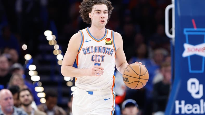Nov 25, 2023; Oklahoma City, Oklahoma, USA; Oklahoma City Thunder guard Josh Giddey (3) dribbles the ball up the court against the Philadelphia 76ers during the second half at Paycom Center. Mandatory Credit: Alonzo Adams-USA TODAY Sports