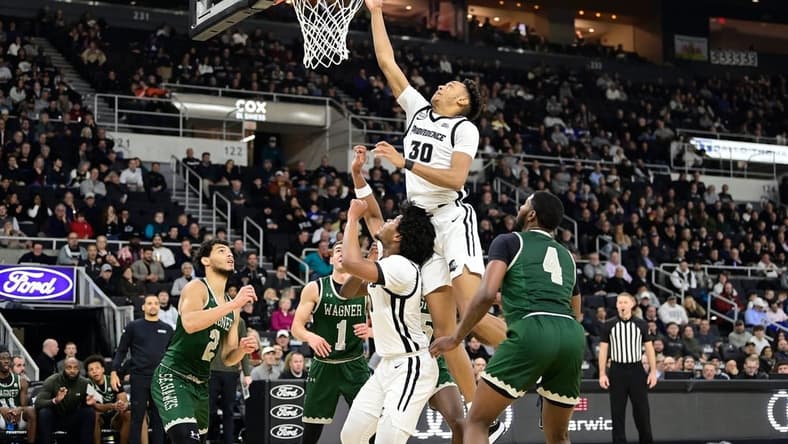Nov 28, 2023; Providence, Rhode Island, USA; Providence Friars forward Rafael Castro (30) goes for a lay up against the Wagner Seahawks during the first half at Amica Mutual Pavilion. Mandatory Credit: Eric Canha-USA TODAY Sports